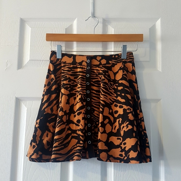 Urban Outfitters Dresses & Skirts - Animal cheetah print mini skater circle skirt brown black Urban Outfitters small